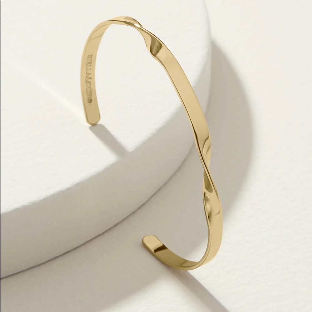 Twisted gold cuffs